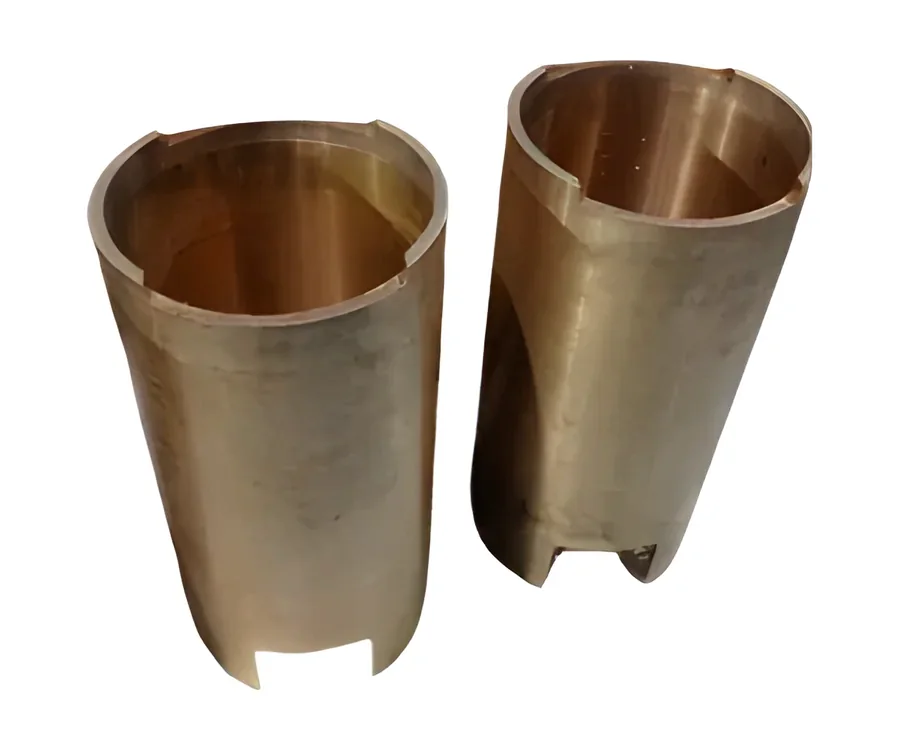 Two custom bronze liners with cut-outs at the base