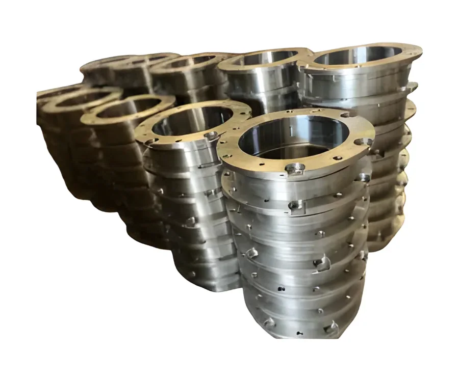 Stacks of machined cast flanges