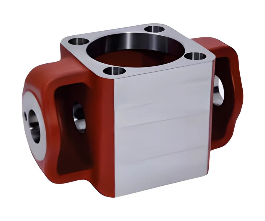 Red-painted cast block with machined faces