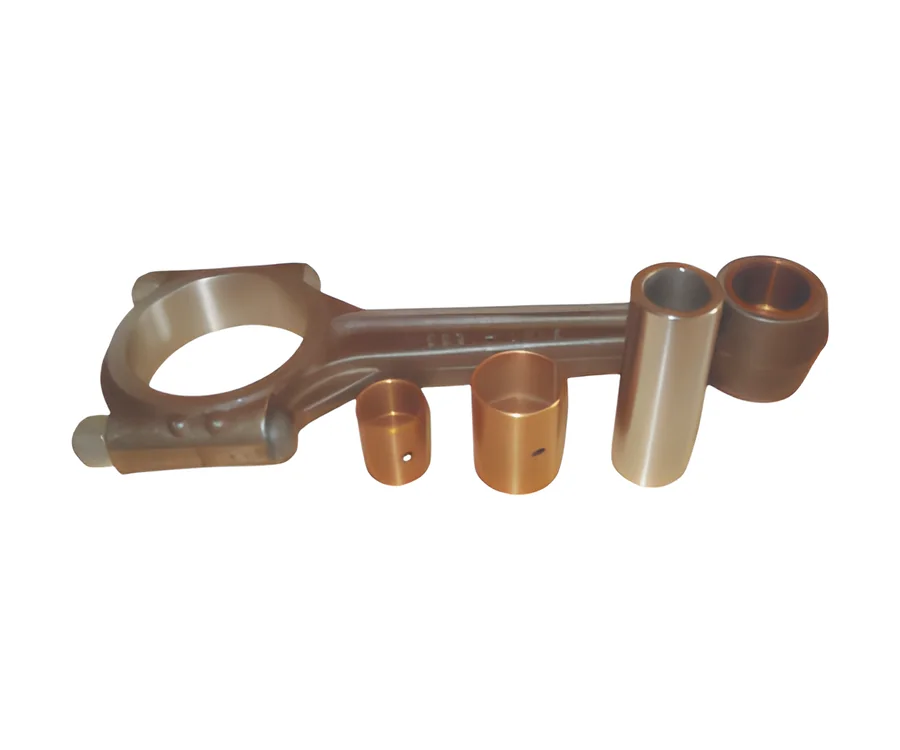 Connecting rod assembly with bronze bushings and a piston pin
