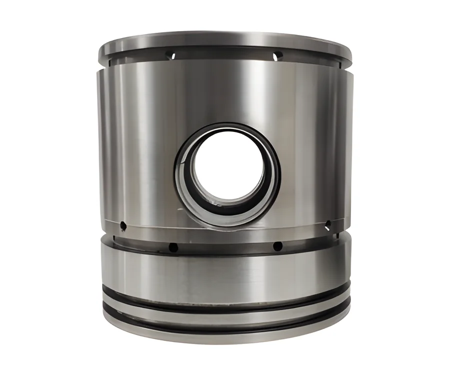 Compressor piston with ring grooves and a pin bore