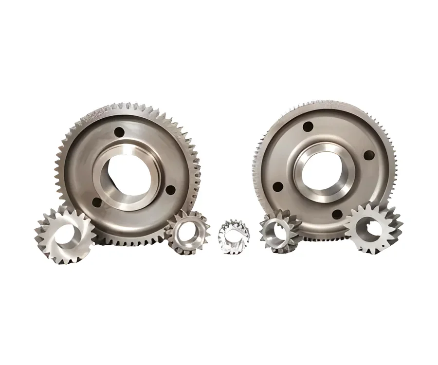 Two large machined gears with small pinions in front
