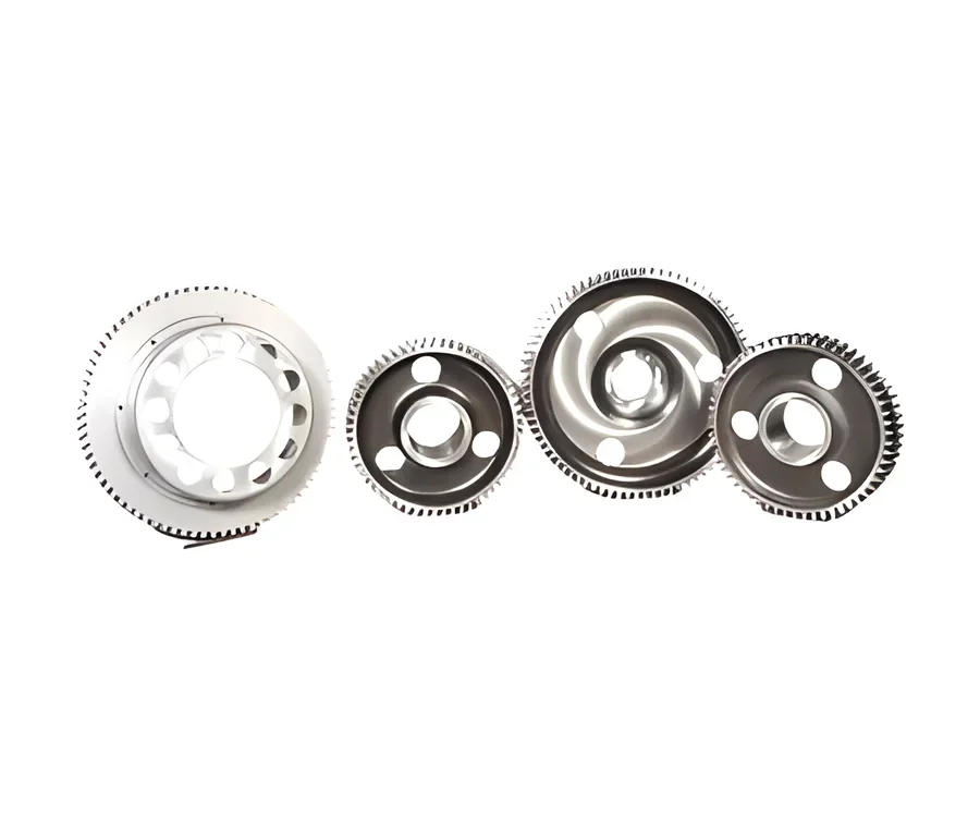 Four machined gears laid out side by side